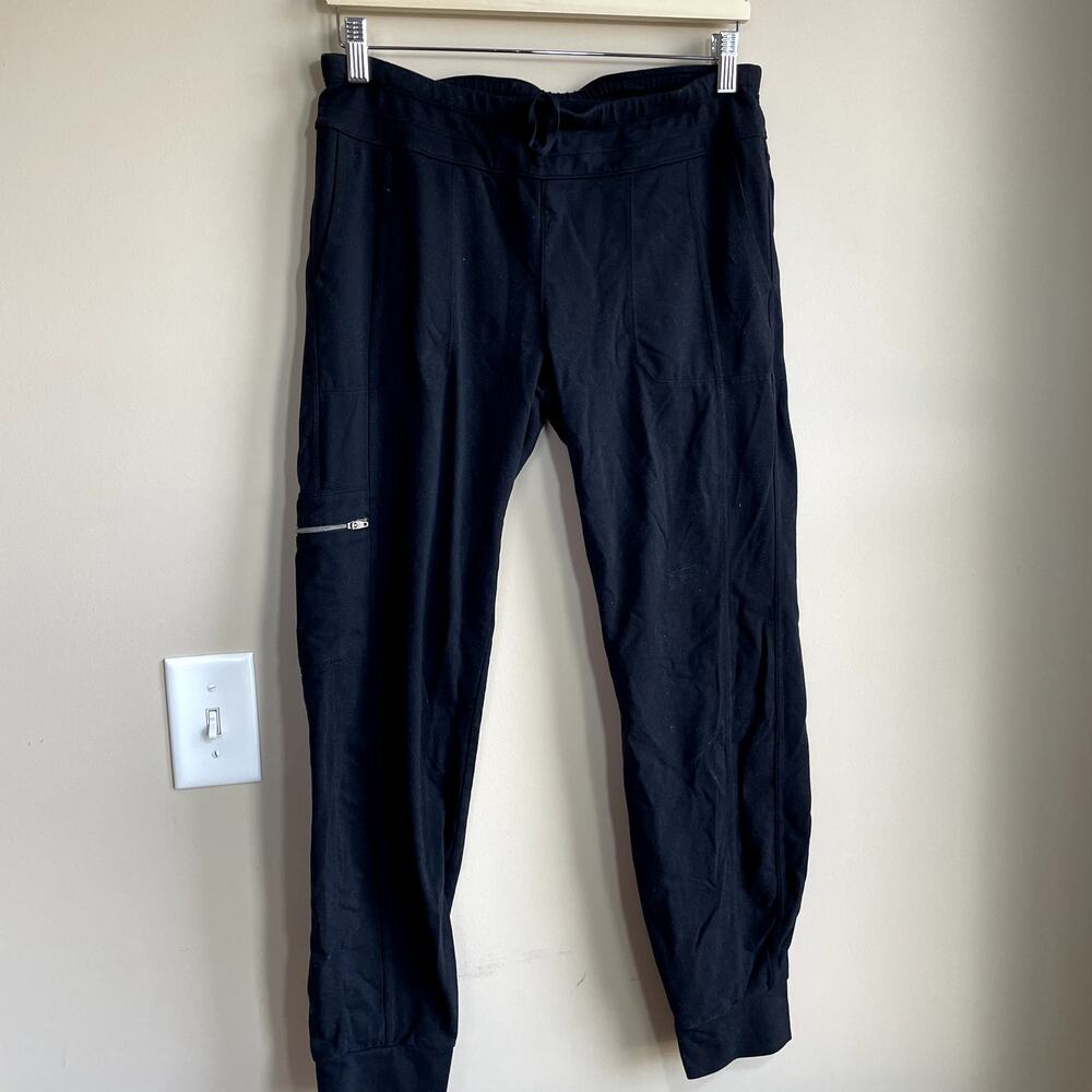 Athleta black trousers workout pants women's size M nylon spandex casual